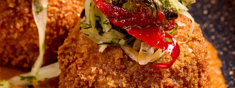 Salmon Cake - Fried house salmon cake, pecan romesco, pepper jam, fennel salad