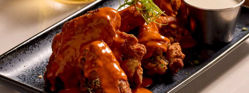 Chicken Wings - Buffalo sauce, ranch dust, blue cheese dressing, scallions