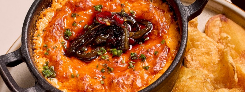 Pimento Cheese Dip - House pimento cheese, pepper jam, chives, chips