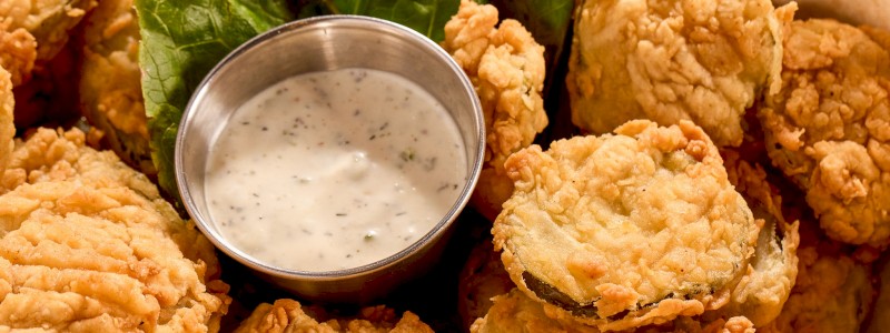 Crispy Fried Pickles - Served with chipotle ranch dressing