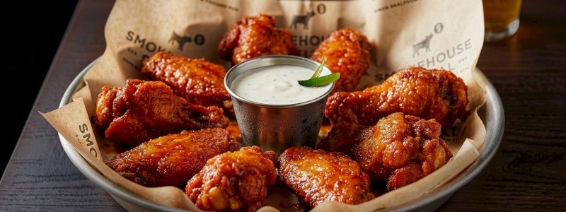 Smoked Chicken Wings - Smoked then fried, house rub, with your choice of sauce
