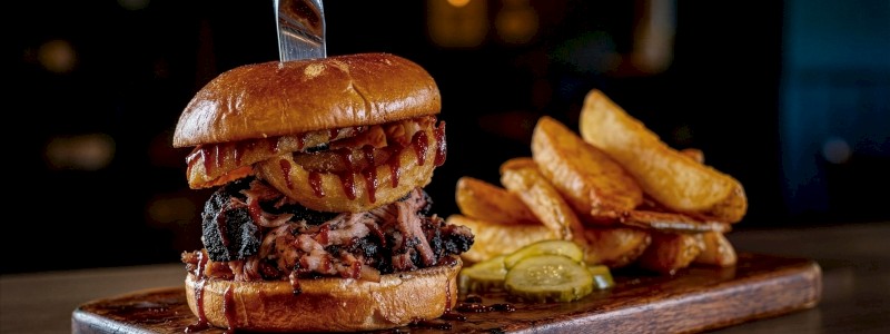 Pulled Pork Sandwich - Topped with fried onions