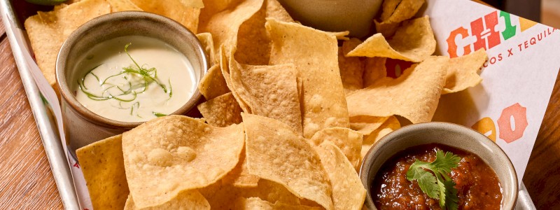 The Three Amigos - House guacamole, queso blanco, and roasted tomato chipotle salsa