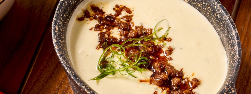 White Lava Queso - Melted Monterey and jalapeño Jack cheese sauce. Add Chorizo +2.50