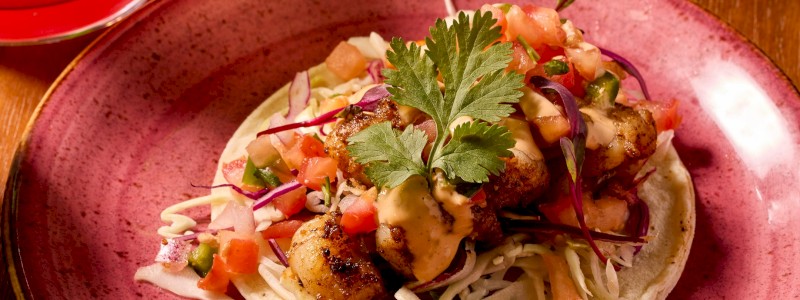 Blackened Shrimp (GF) - Blackened shrimp, pico de gallo, cilantro lime cabbage slaw, and chipotle aioli