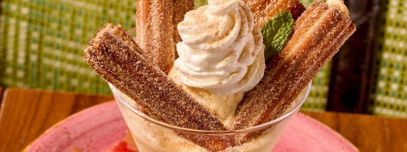 Churro Loco - Strawberry cinnamon compote topped with powdered sugar 
and whipped cream