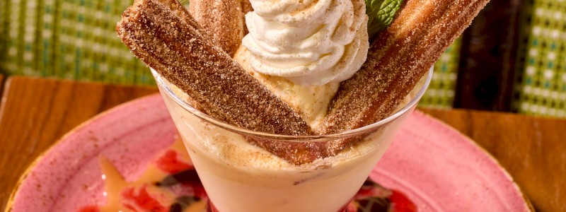 Churro Loco - Strawberry cinnamon compote topped with powdered sugar 
and whipped cream