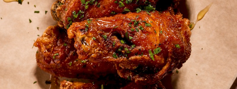 Wings - A dozen tasty buffalo wings with your choice of chili
garlic, buffalo, or honey mustard rubs