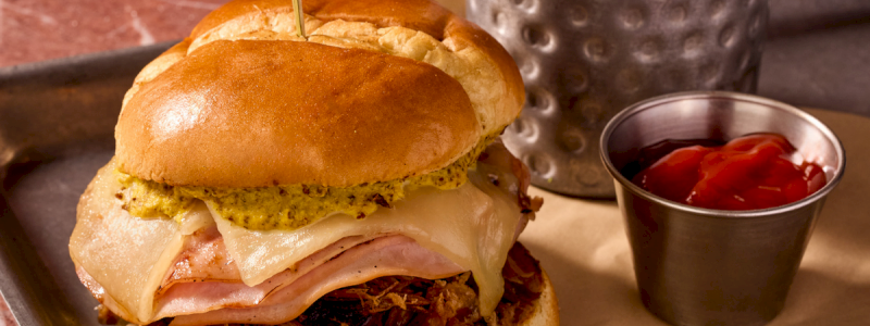 Cuban Connection - House-seasoned pork, ham, cilantro, ground
mustard, and pickle