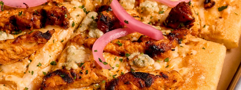 Hot Honey Kickin' Chicken - Buffalo, blue cheese crumbles, and hot honey drizzle