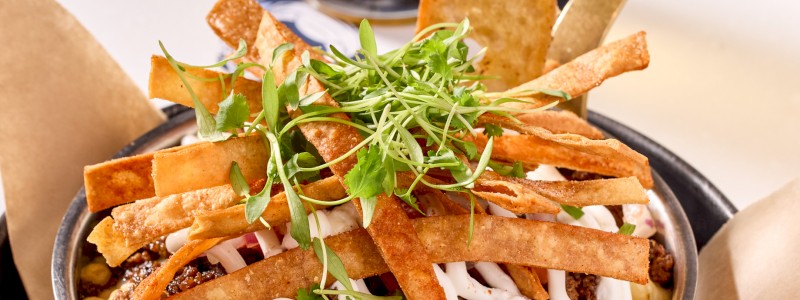 SOUTHWEST MAC - Southwest blend, seasoned ground beef, pico
de gallo, sour cream, and tortilla strips.