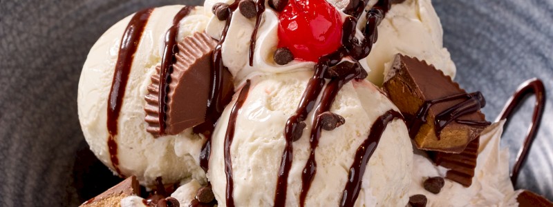 CBK PEANUT BUTTER BLONDIE SUNDAE - Blondie chunks, peanut butter cups, and vanilla bean ice
cream, topped with chocolate sauce.