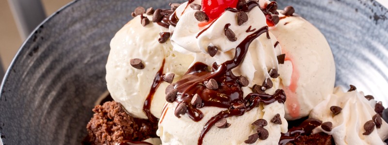 THE SWEET SPOT - Molten brownie bites, hot fudge, whipped topping,
Maraschino cherries, and vanilla bean ice cream.