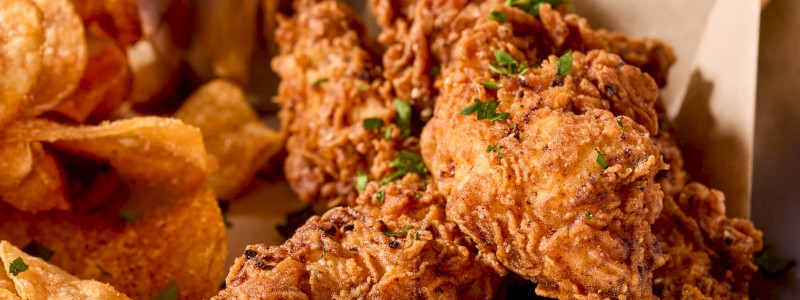 CHICKEN TENDERS - Three breaded chicken tenders, regular or Nashville
Hot, with your choice of side.