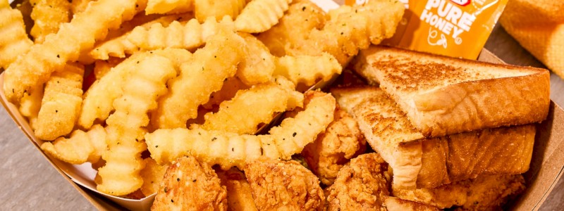 POPCORN CHICKEN MEAL #2 - 10 oz freshly breaded and fried popcorn chicken with Texas toast, honey, and two sides