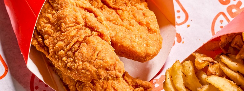CRISPY CHICKEN TENDERS - Three pieces of crispy fried chicken, served with waffle fries