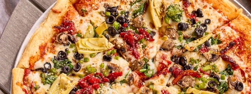 SUPREME VEGGIE - Sun-dried tomatoes, spinach, mushrooms, tomatoes, green peppers, and black olives