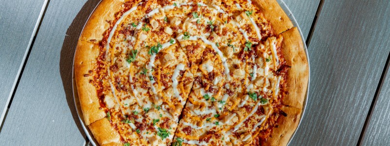 BUFFALO CHICKEN RANCH - Grilled chicken, bacon bits, and buffalo swirl